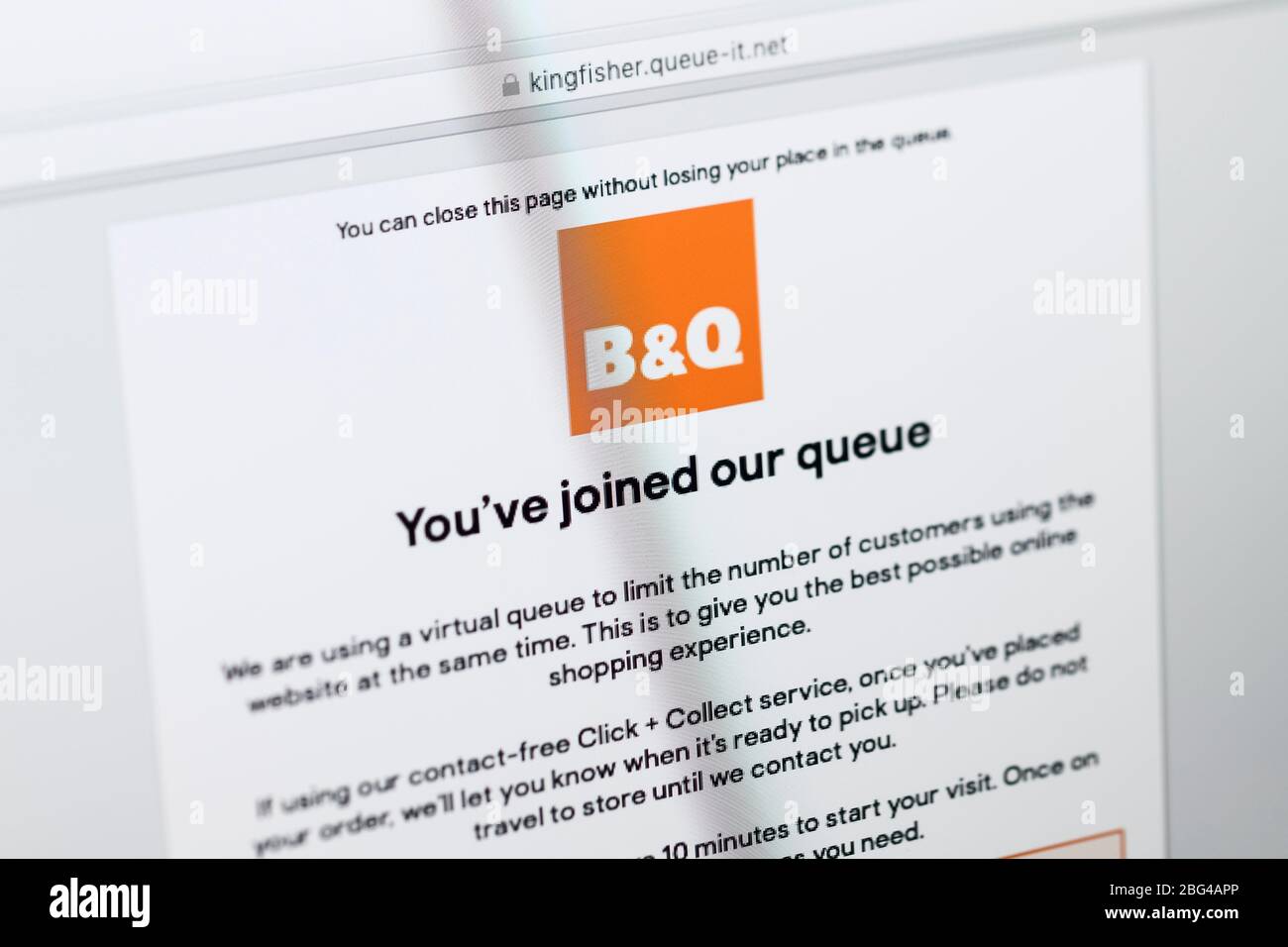 Close up detail of the home page for DIY store B and Q showing that a queue system is in place for online orders Stock Photo