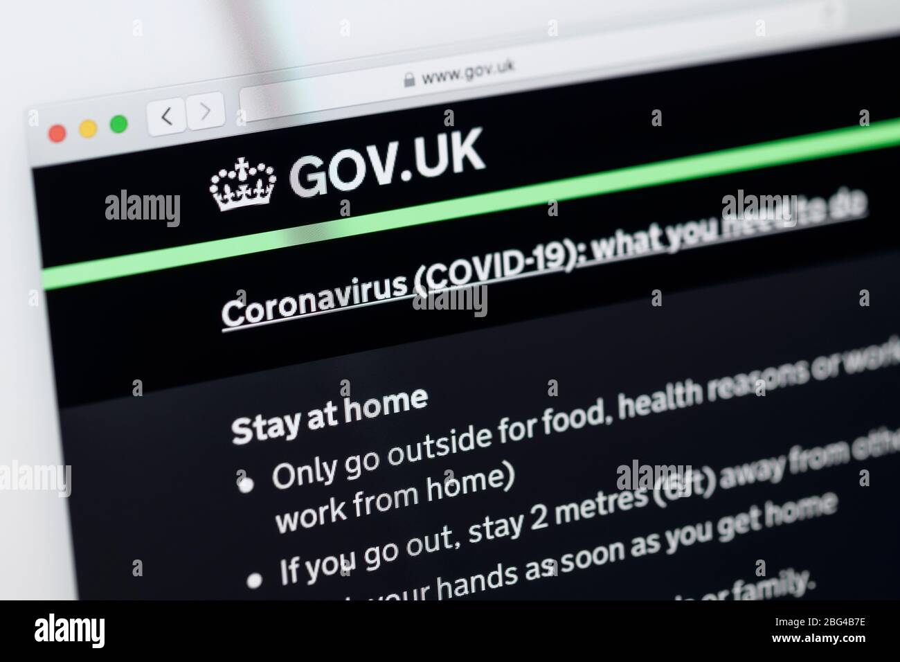 Close up detail of the home page of the UK government website showing information about Coronavirus Covid 19 Stock Photo