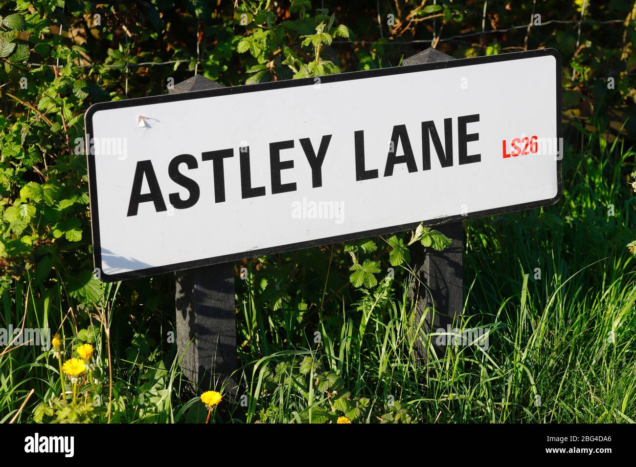 Astley Lane sign is located at the side of the road into Swillington