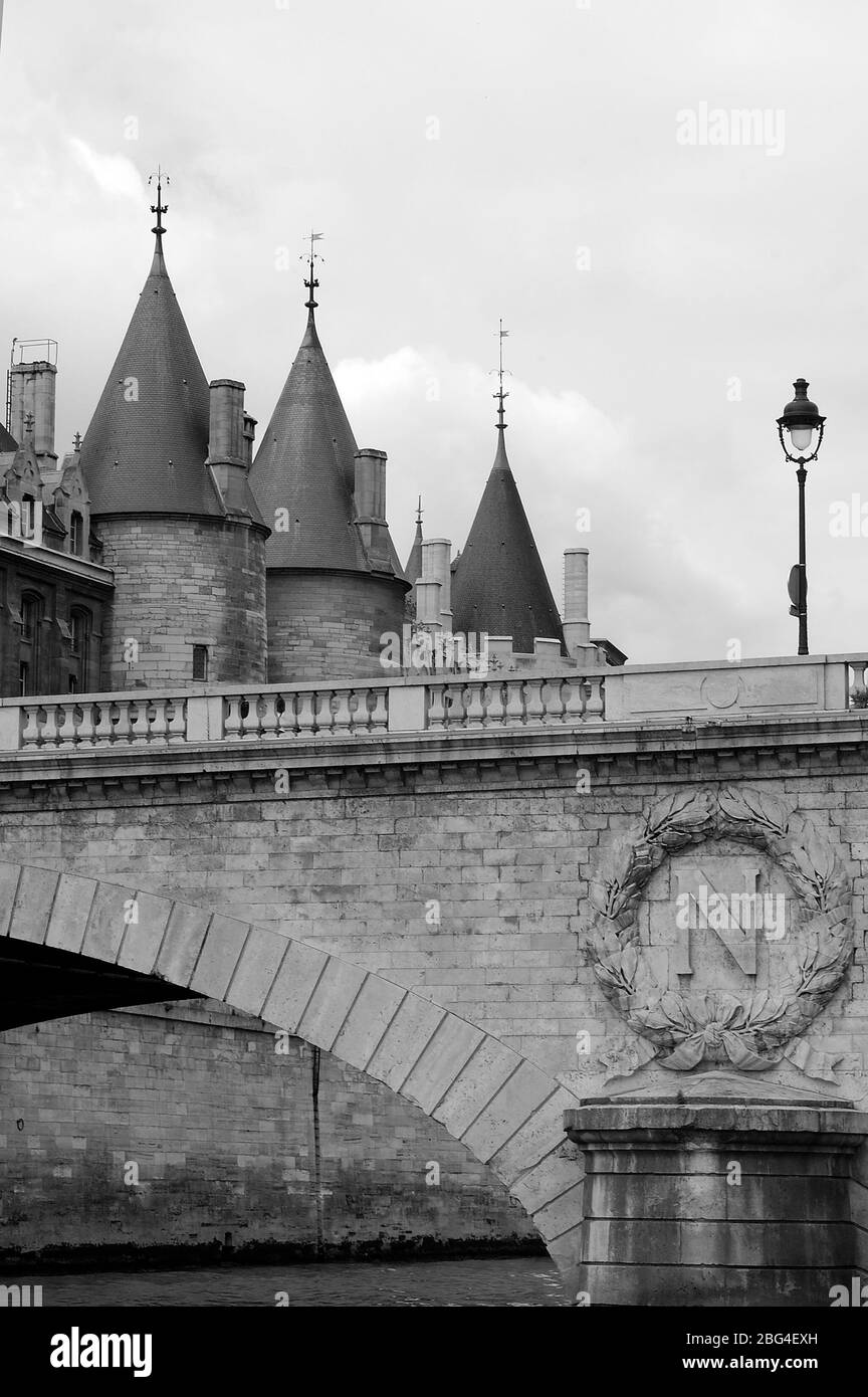 Black and white view of the Pont au Change bridge over the River Seine with the Palais de la Cite on the Ile de la Cite at the rear - Paris, France Stock Photo
