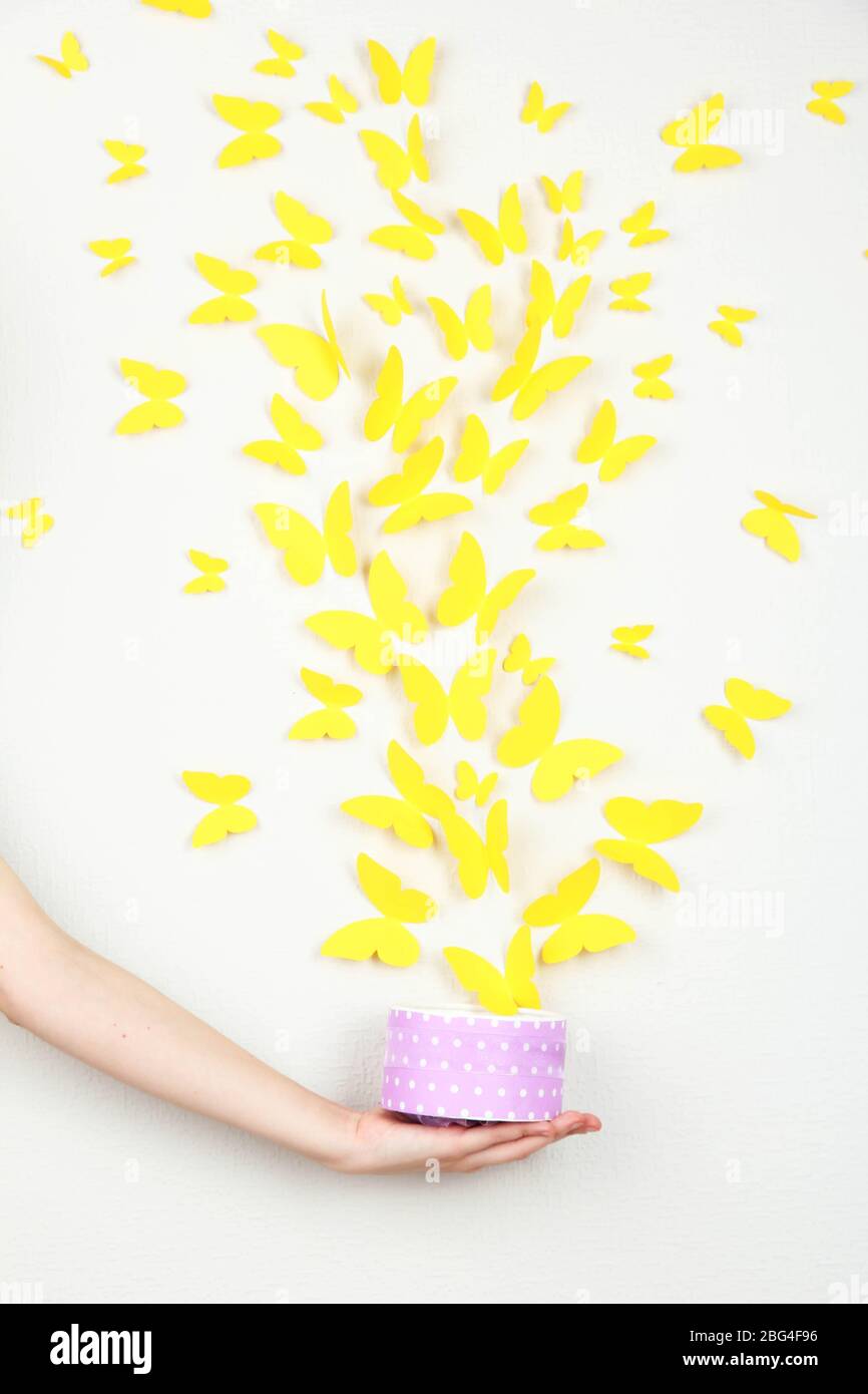Paper yellow butterflies fly out of box Stock Photo Alamy