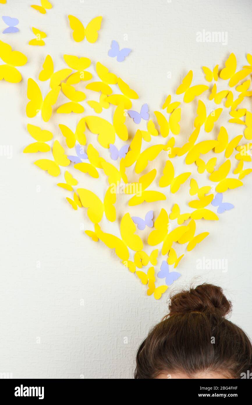 Paper yellow butterflies fly thoughts out of head Stock Photo