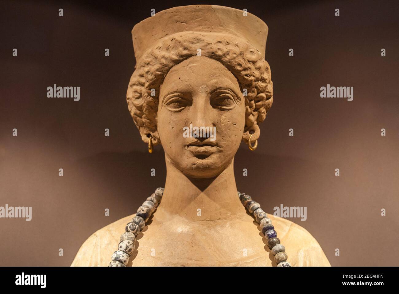 Carthaginian goddess Tanit. Bust Garnished with jewelry. Catalan Museum of Archaeology, Barcelona, Spain Stock Photo