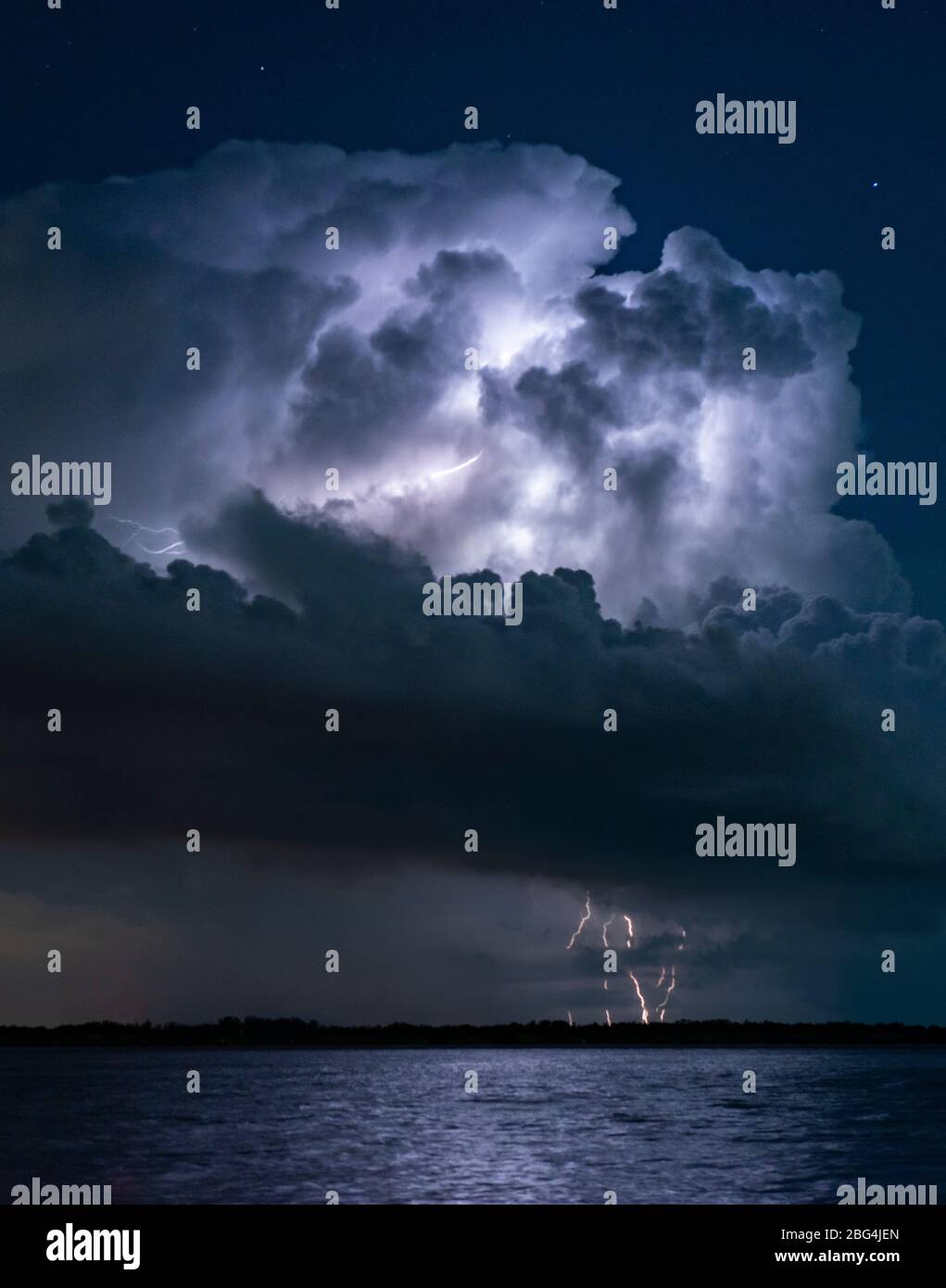 Massive Lightning Strike on Florida Coast at Night Long Exposure Stock