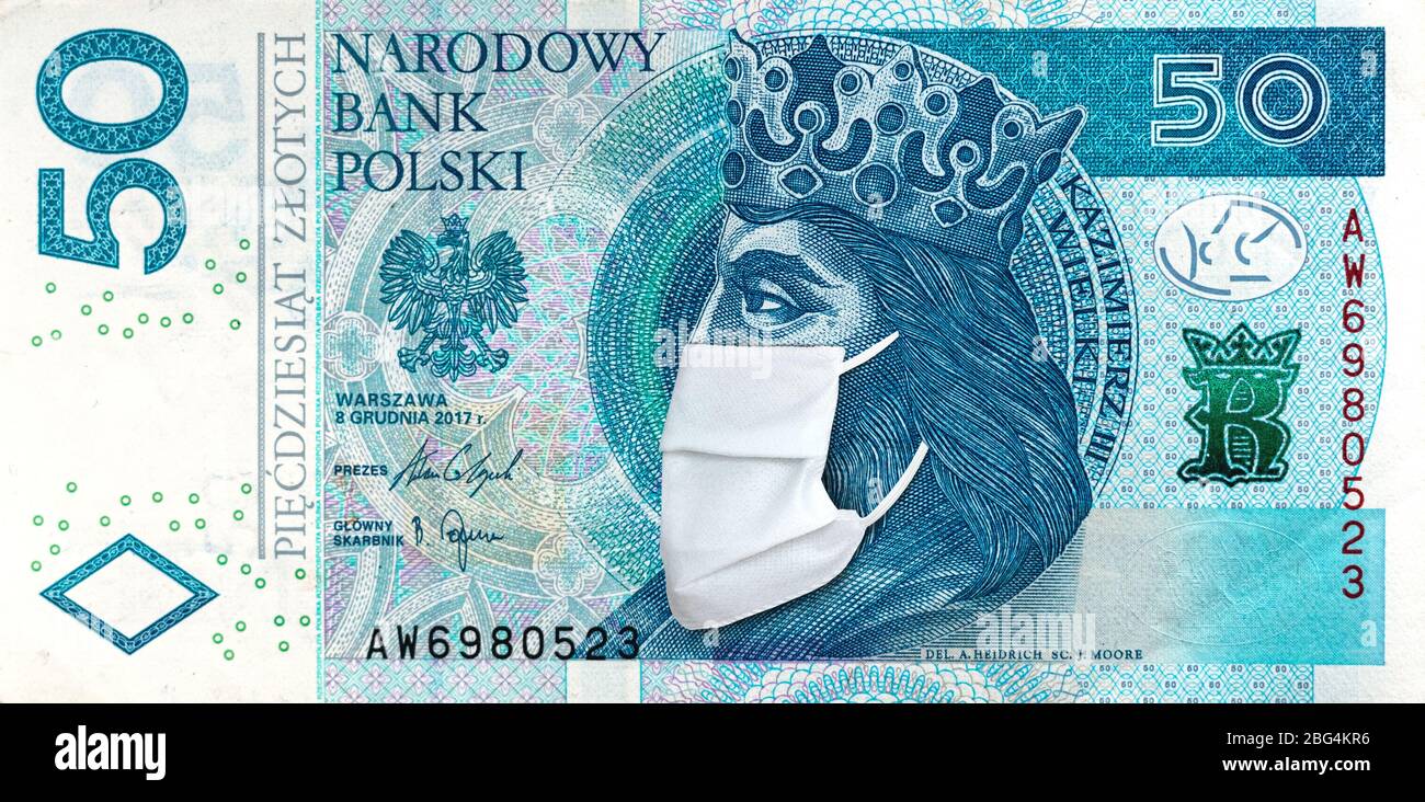 Polish banknote 50 zloty with face mask against Coronavirus pandemic. National Bank of Poland prints bilions zlotych to save Polish economy and preven Stock Photo