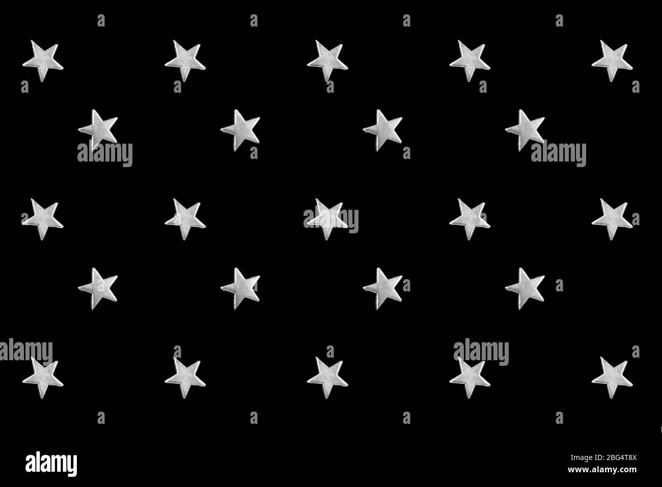 Silver stars pattern on black Stock Photo