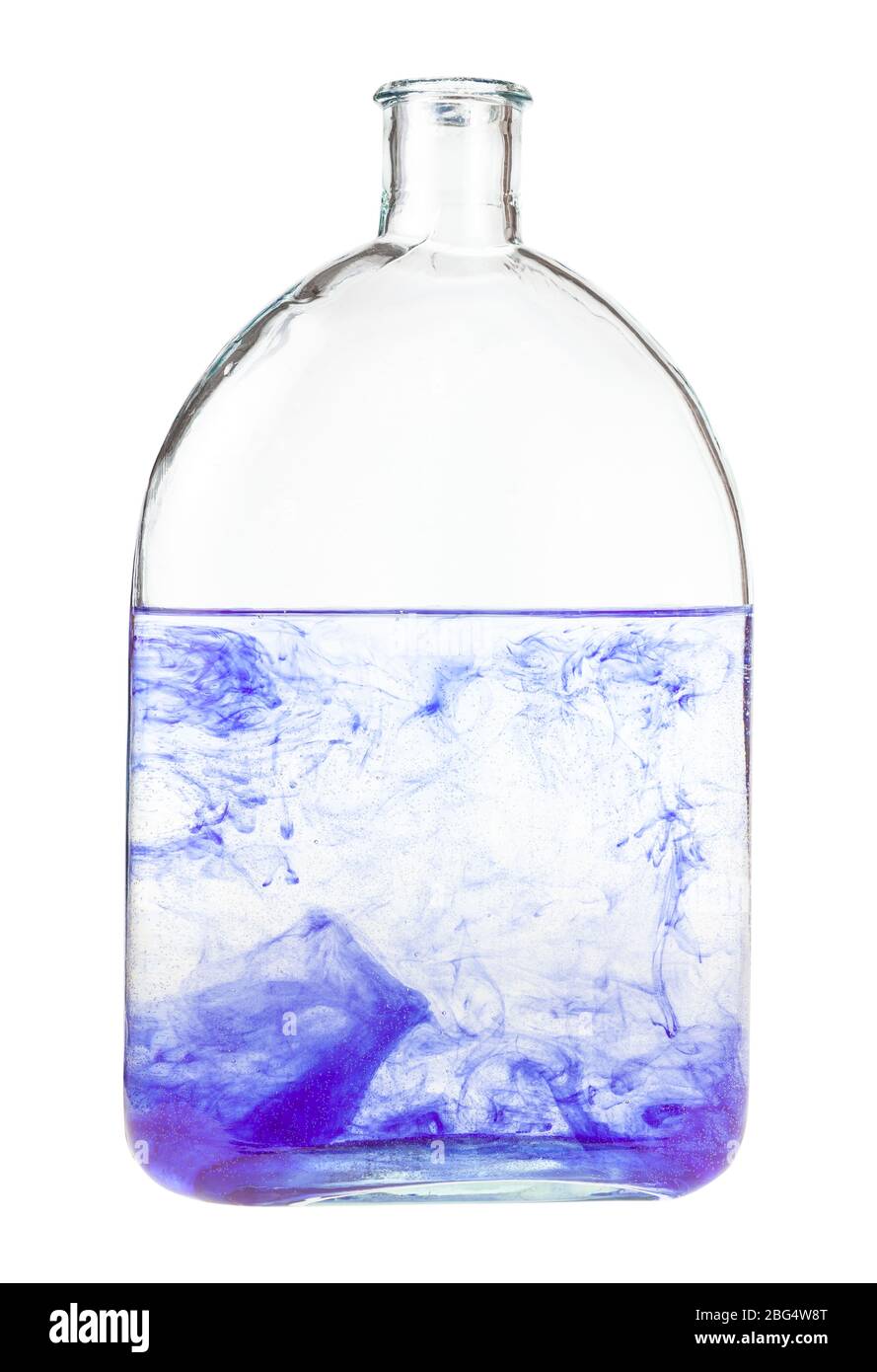 violet watercolour dissolves in water in bottle isolated on white background Stock Photo