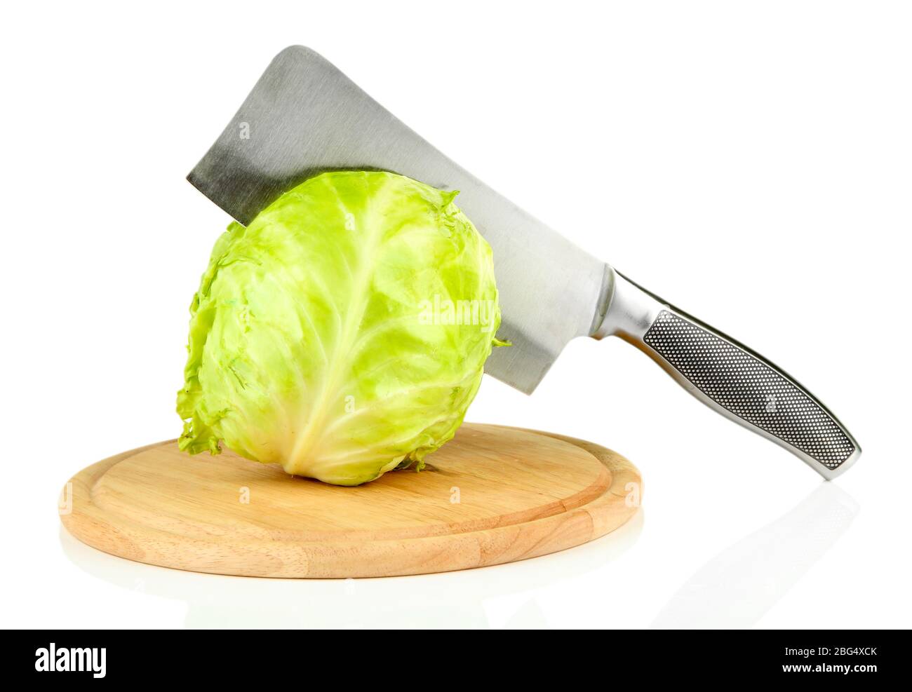 Green cabbage with knife on cutting board, isolated on white Stock