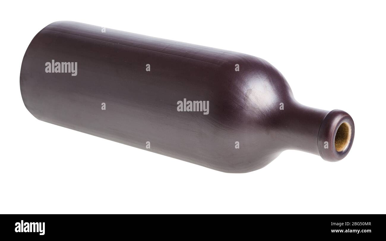 lying black ceramic bottle isolated on white background Stock Photo