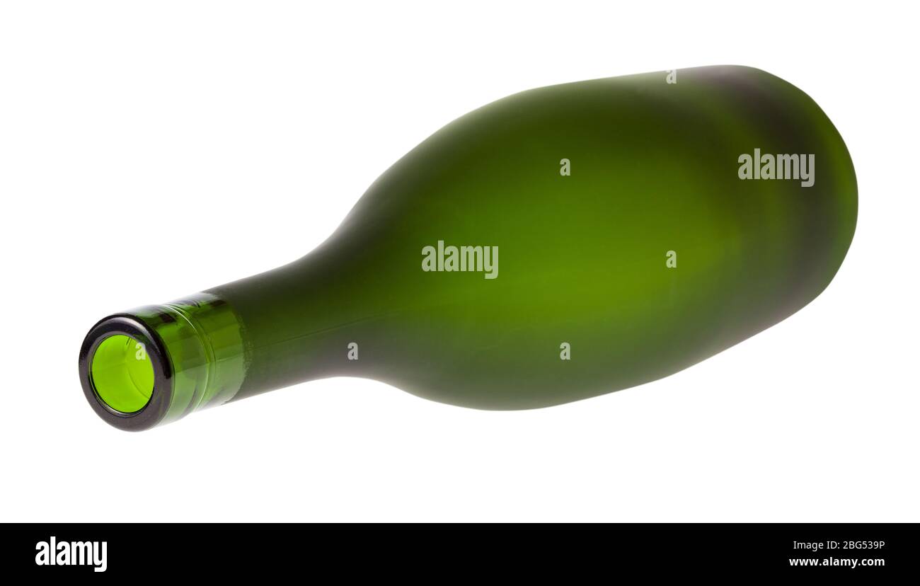lying empty green brandy bottle isolated on white background Stock