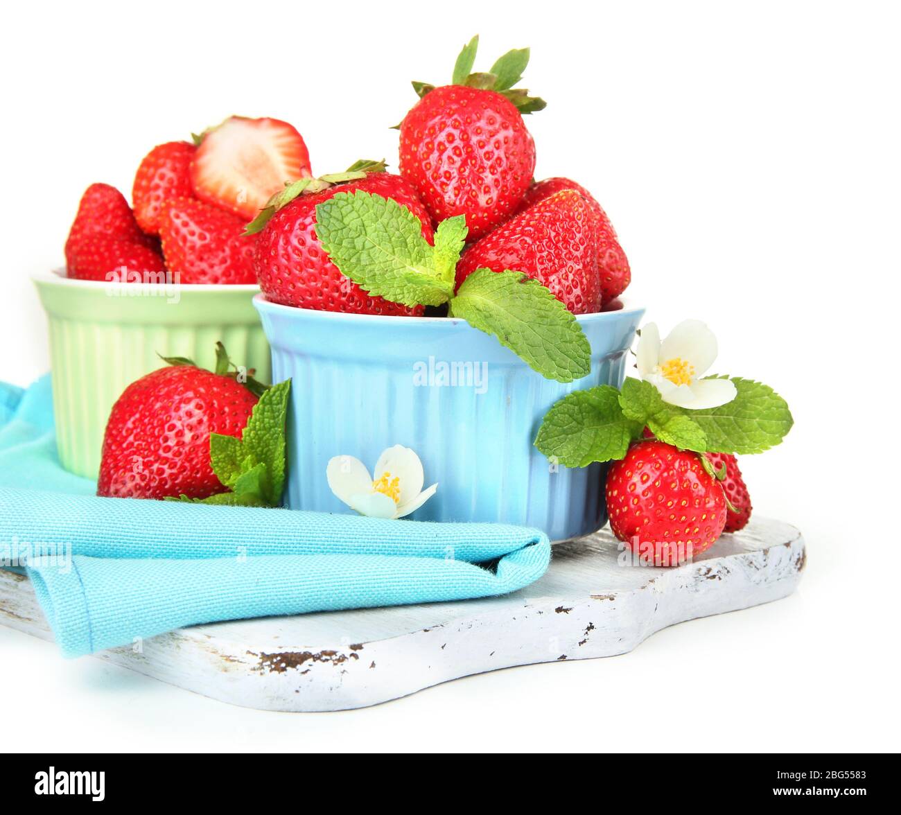 Ripe sweet strawberries in bowls, isolated on white Stock Photo - Alamy