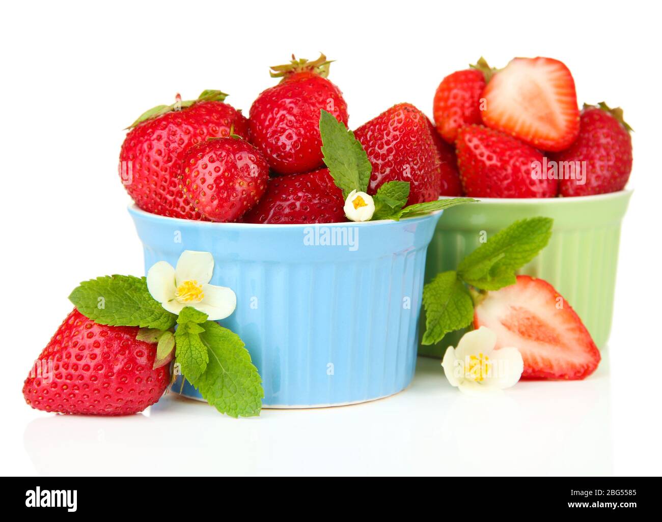 Ripe sweet strawberries in bowls, isolated on white Stock Photo - Alamy
