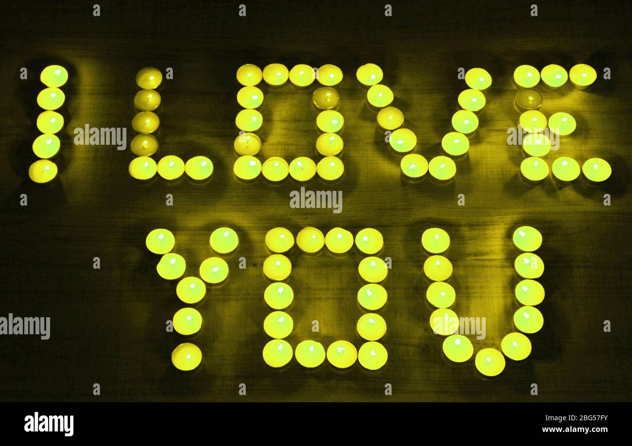 Romantic candles on dark background Stock Photo Alamy