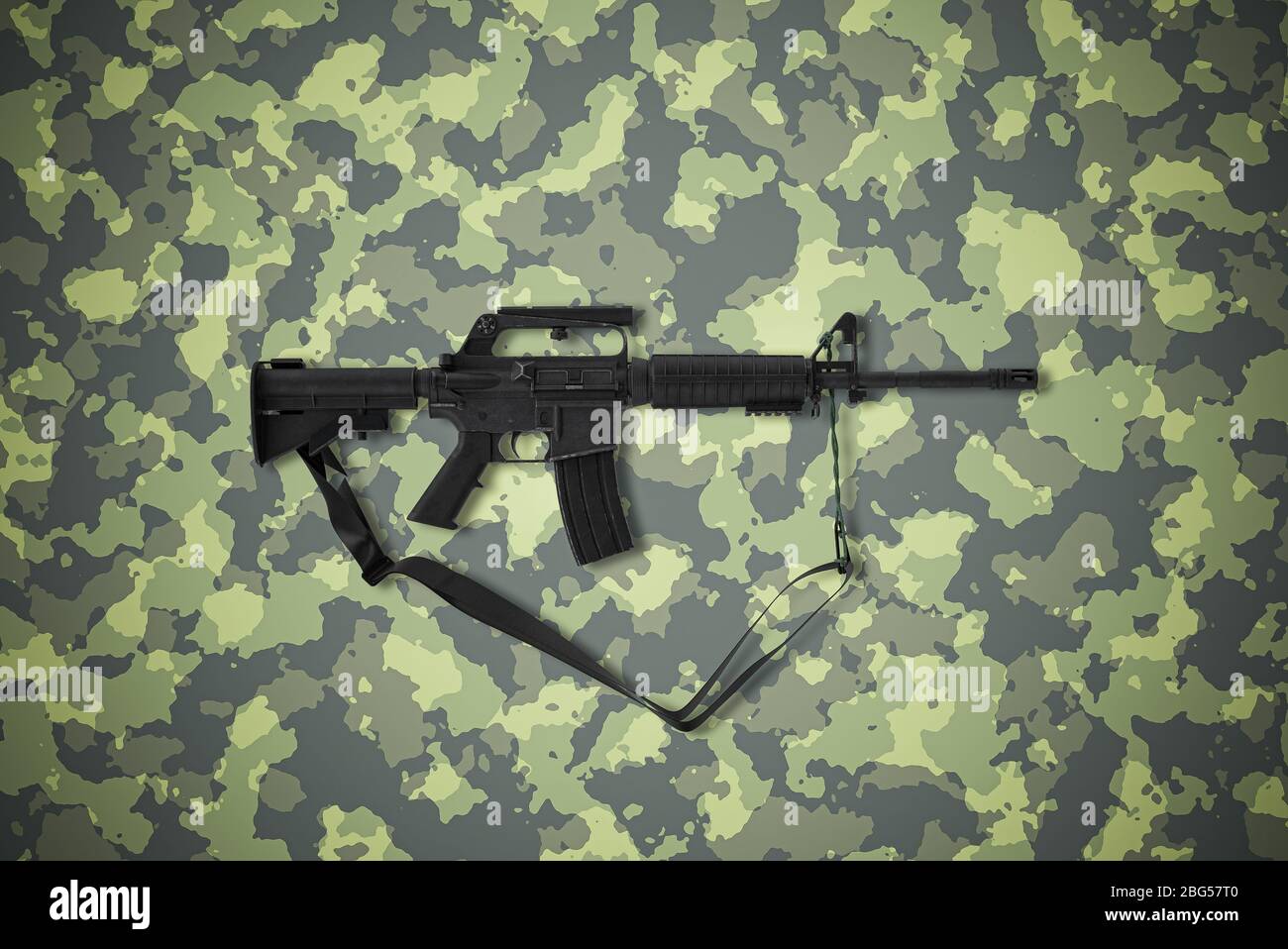 American caliber 5.56 mm rifle on camouflage background Stock Photo