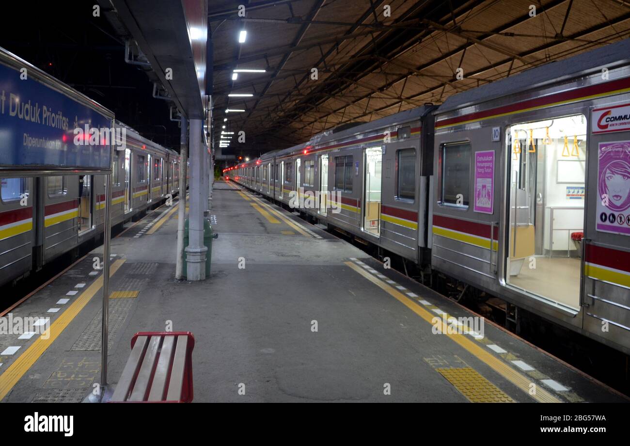 Empty platform and train wagons in Bogor Railway Station in the evening. Stock Photo