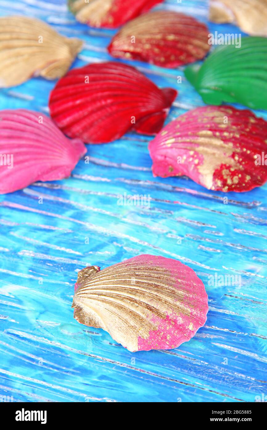 Colorful seashells on bright background Stock Photo - Alamy