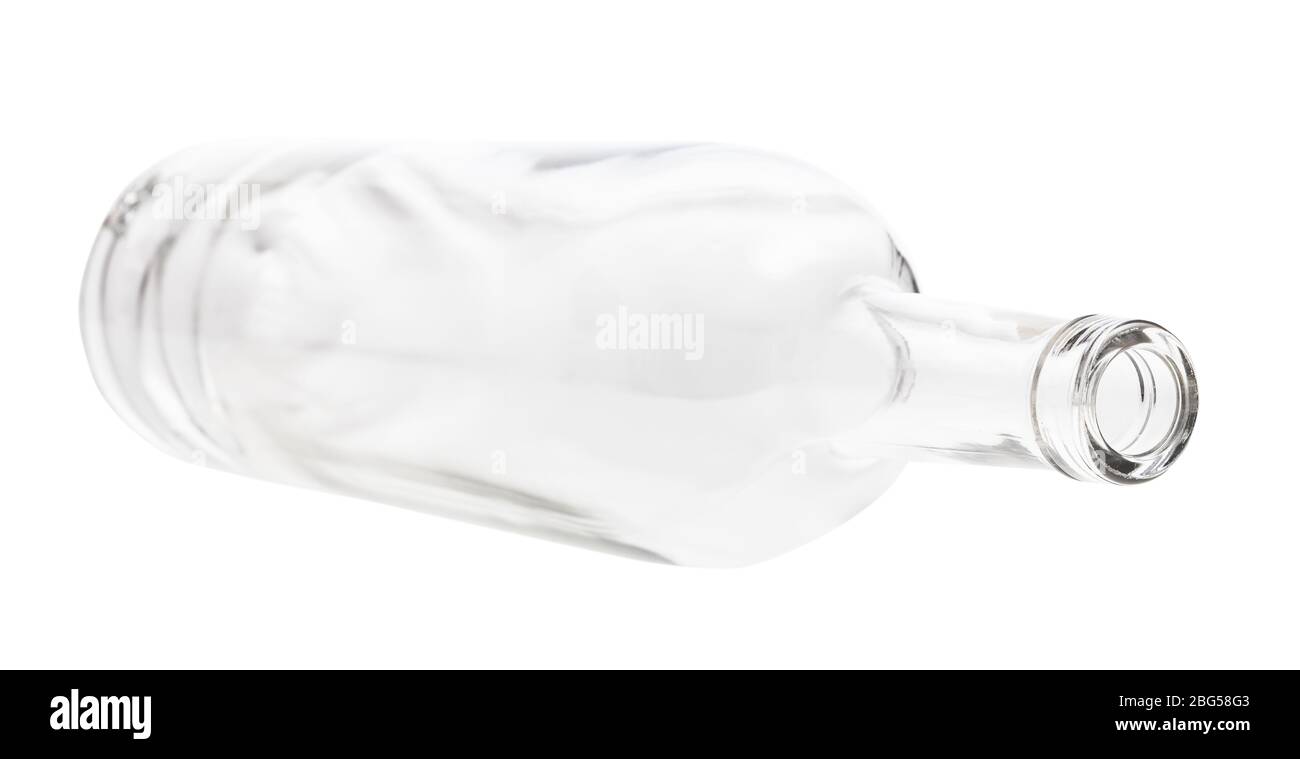 lying empty clear bottle isolated on white background Stock Photo