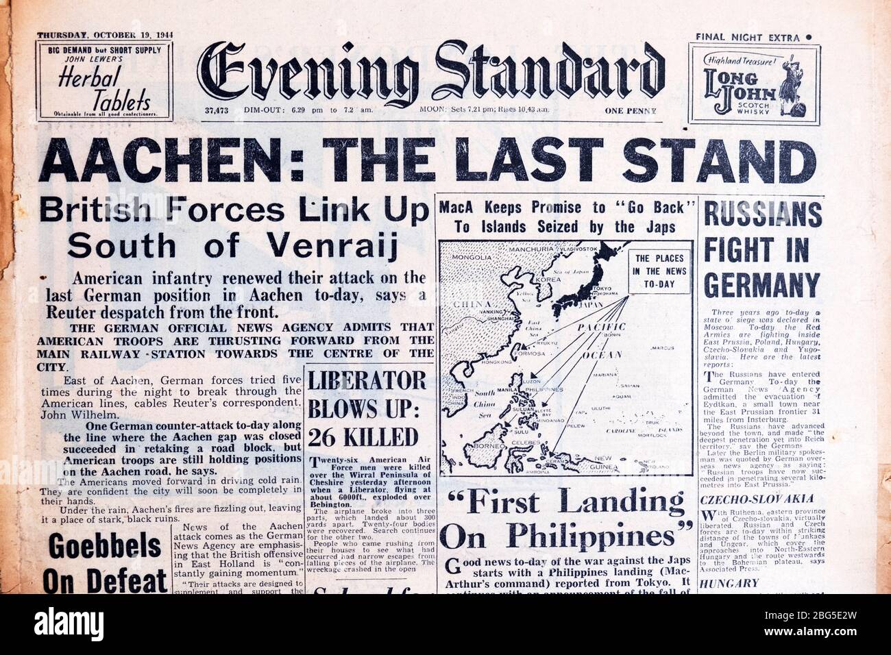 ' AAchen: The Last Stand  Evening Standard' 'British Forces Link Up South of Venraij'  WWII  British newspaper headlines 19 October 1944 London UK Stock Photo