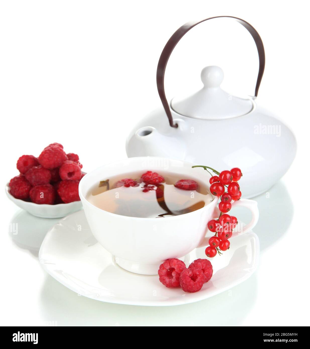 Cup of berry tea isolated on white Stock Photo - Alamy