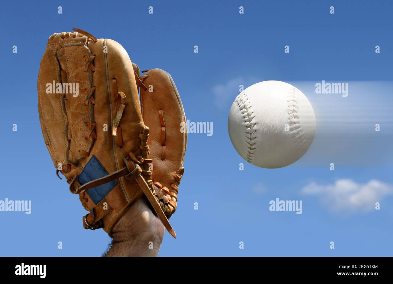 baseball glove catching ball in air Stock Photo Alamy