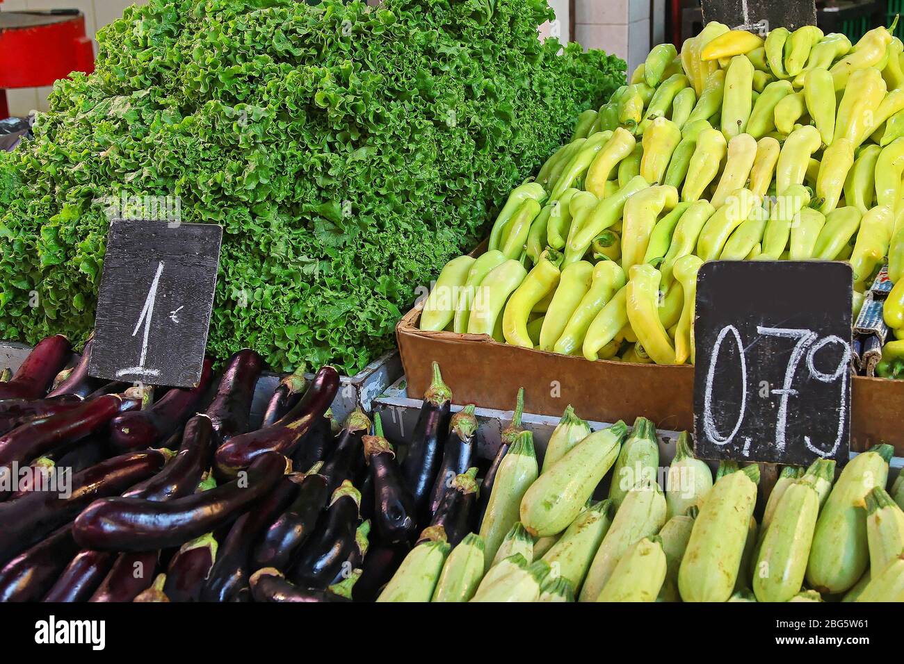 Fresh organic ripe vegetables sold on market stall Stock Photo - Alamy