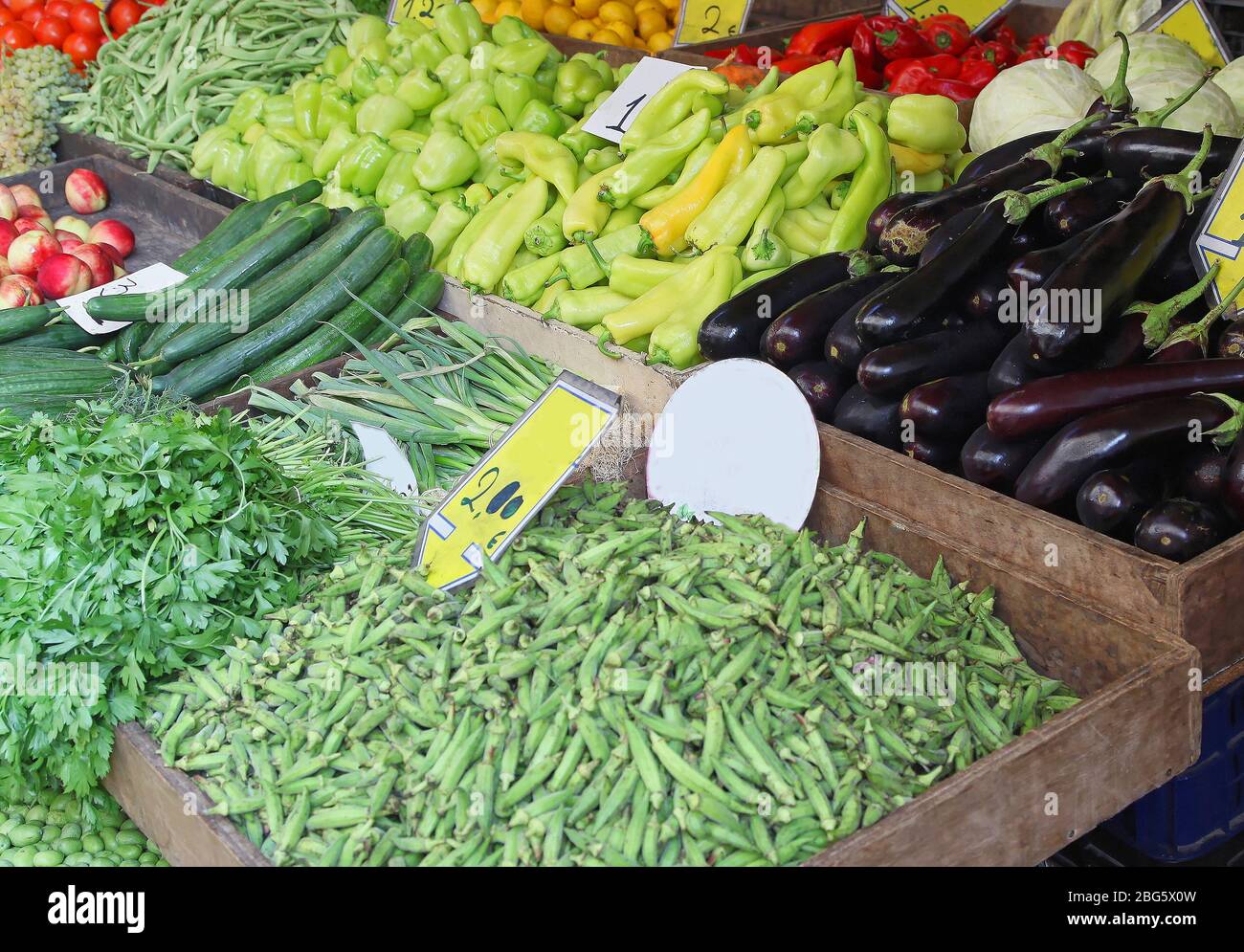 Fresh organic vegetables piles sold on market stall Stock Photo - Alamy