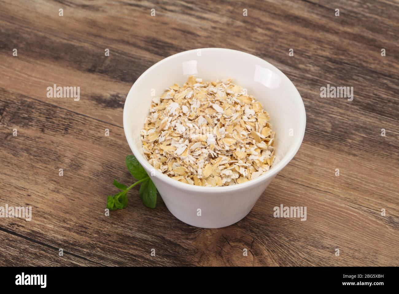 Raw oats in the bowl for breakfast Stock Photo Alamy