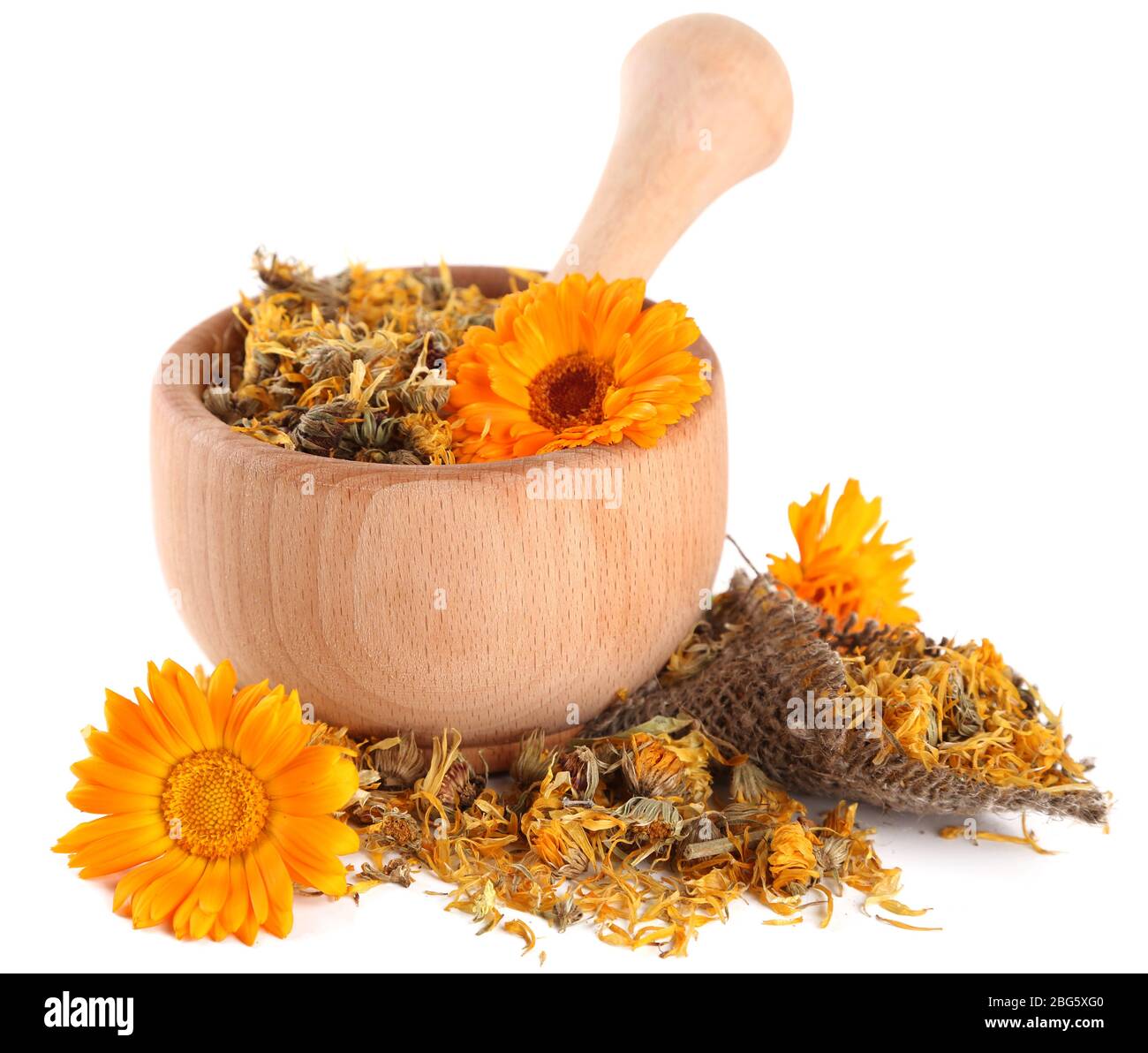 Fresh and dried calendula flowers in wooden mortar isolated on white ...