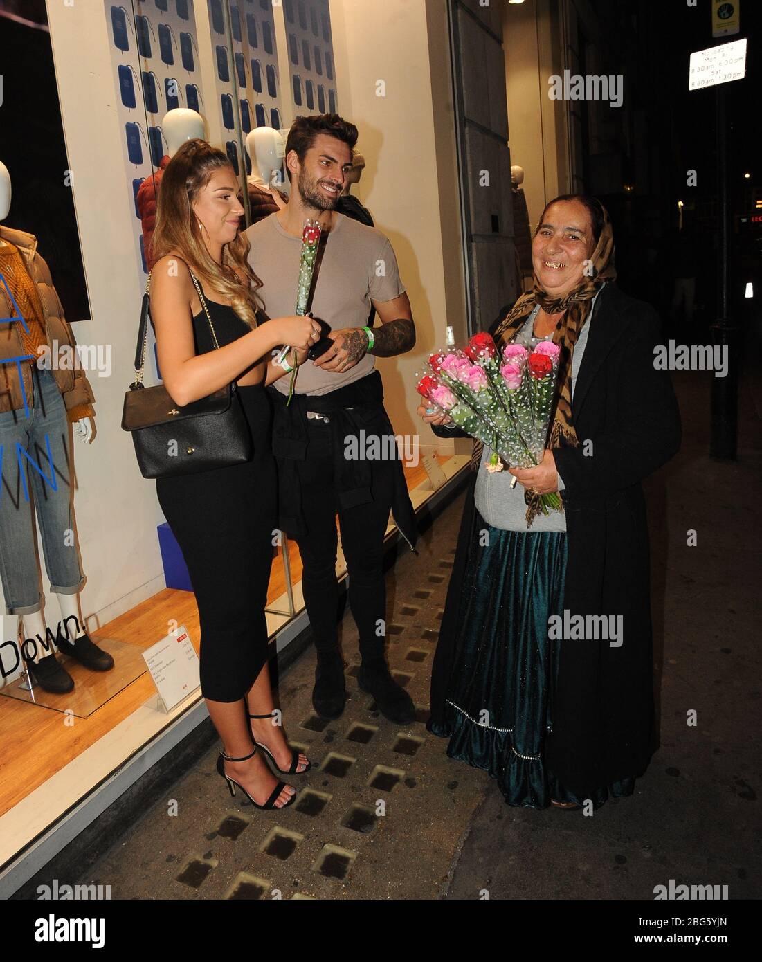 Adam Collard and Zara McDermott In The Style Dani Dyer Launch at