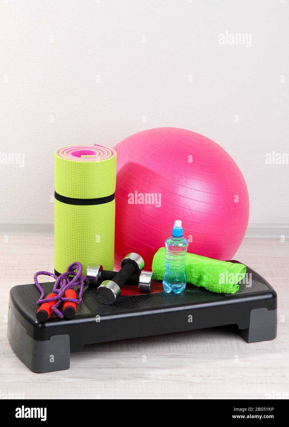 Different tools for fitness in room Stock Photo - Alamy