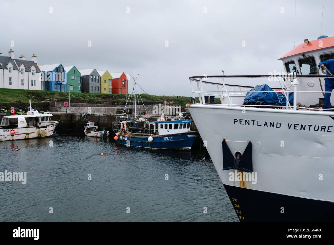 The Pentland Venture passenger ferry moored in the small harbour in John O' Groats after a busy day ferrying people to Orkney and back. Stock Photo