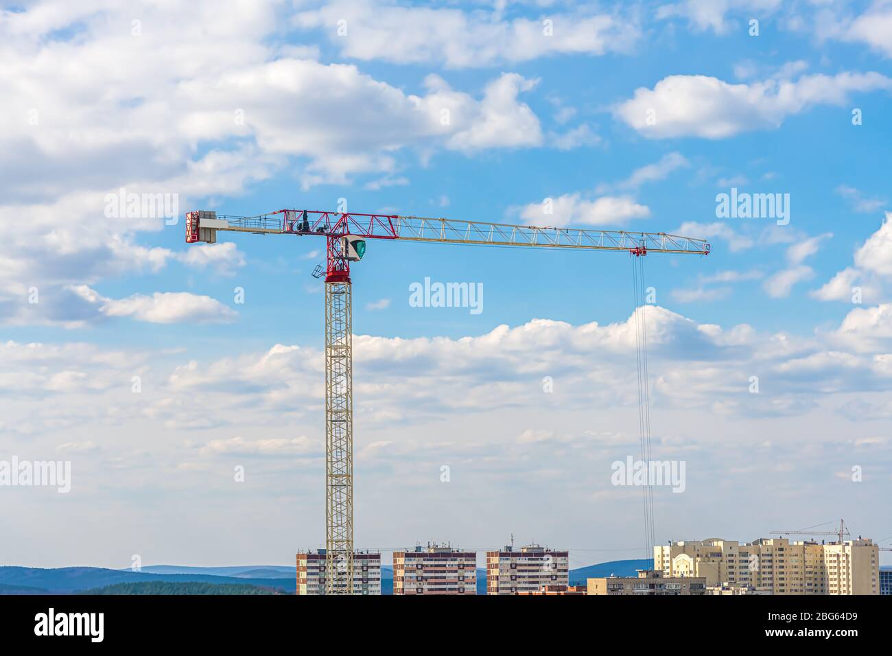construction crane on a sky background, clouds Stock Photo - Alamy
