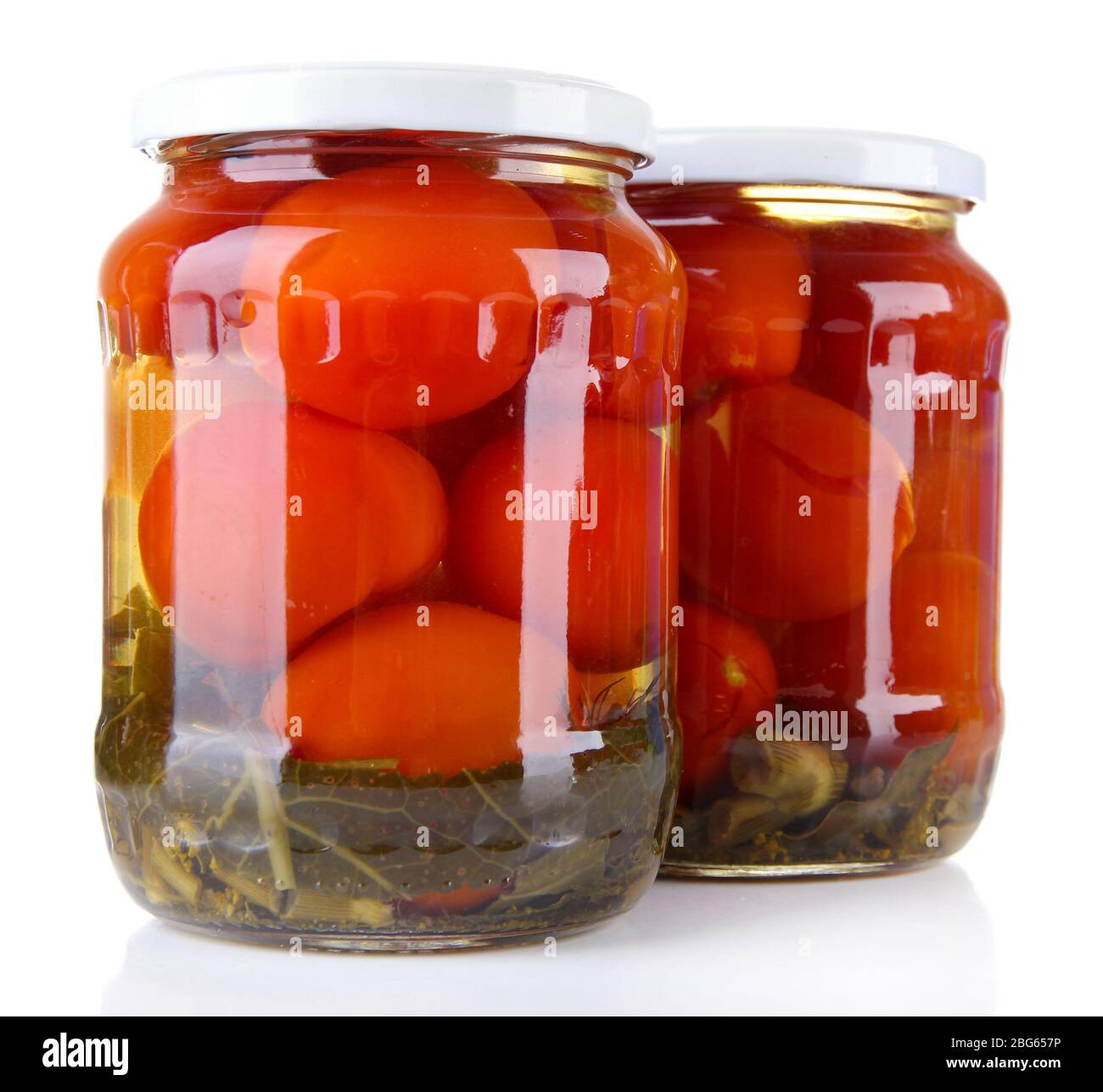 Tasty canned tomatoes in glass jars, isolated on white Stock Photo Alamy