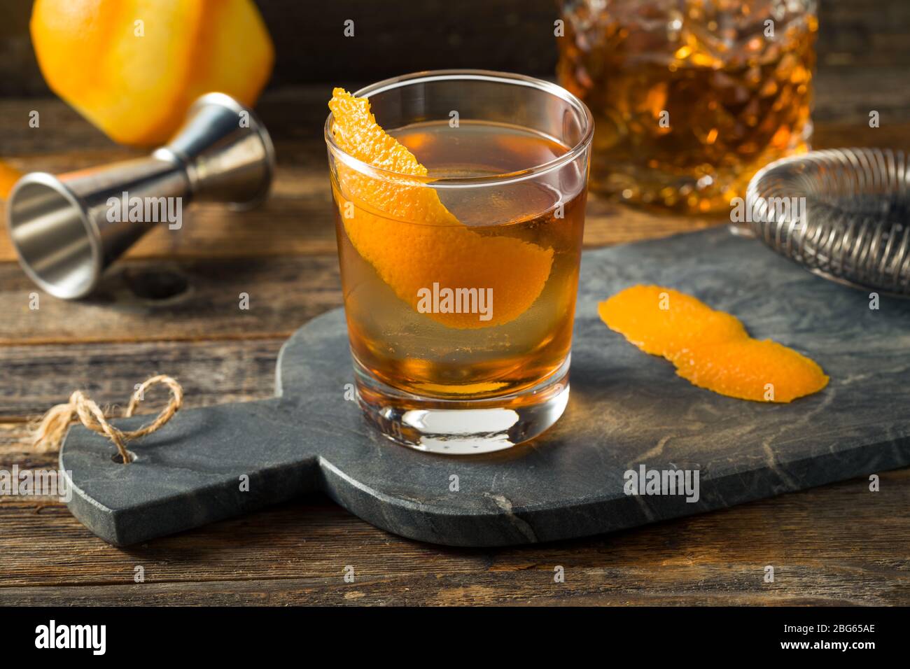 Refreshing Bourbon Old Fashioned Cocktail with Round Ice Cube Stock