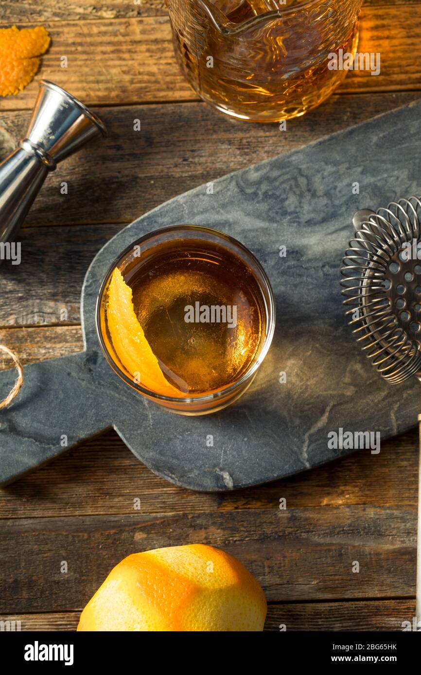 Refreshing Bourbon Old Fashioned Cocktail with Round Ice Cube Stock