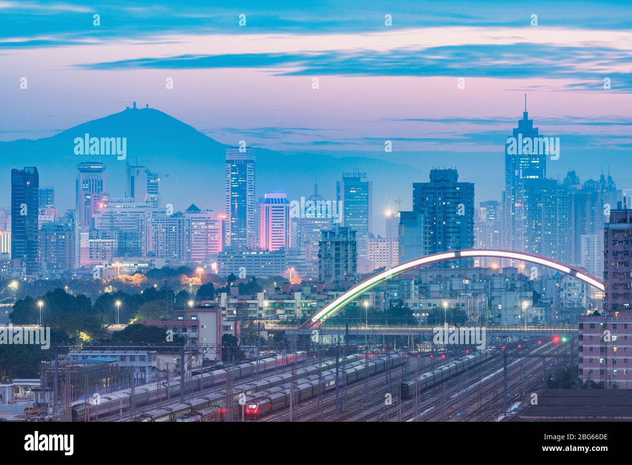 Cityscape and railway station at evening time. Shenzhen. China 