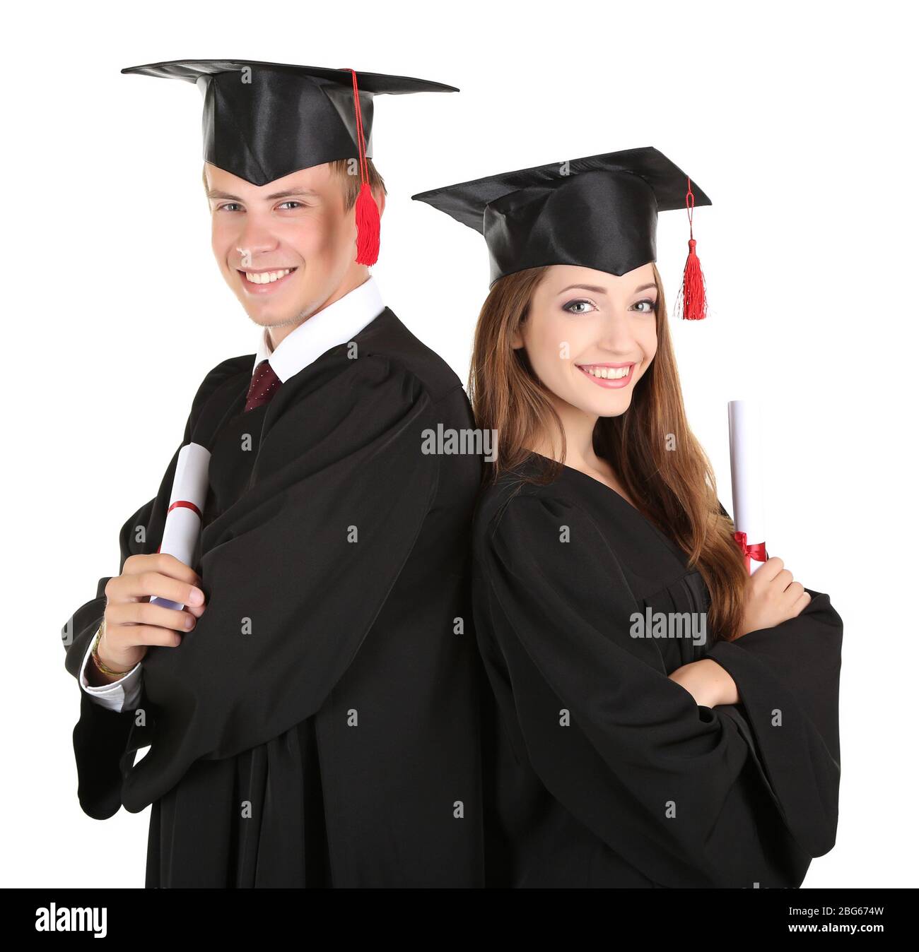 Two happy graduating students isolated on white Stock Photo - Alamy