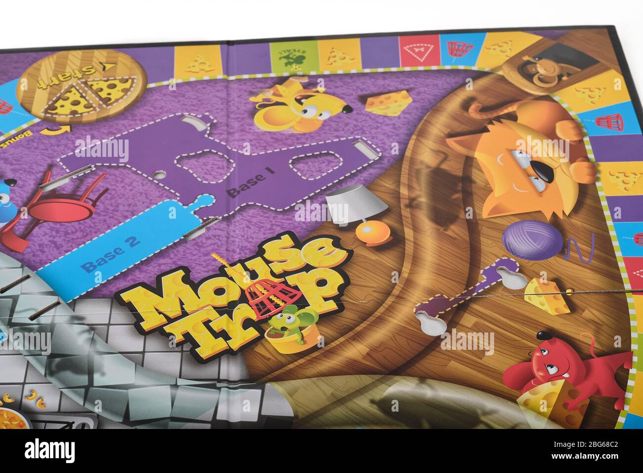 https://c8.alamy.com/comp/2BG68C2/close-up-of-hasbro-mouse-trap-board-game-board-ready-for-game-pieces-to-be-assembled-onto-it-2BG68C2.jpg