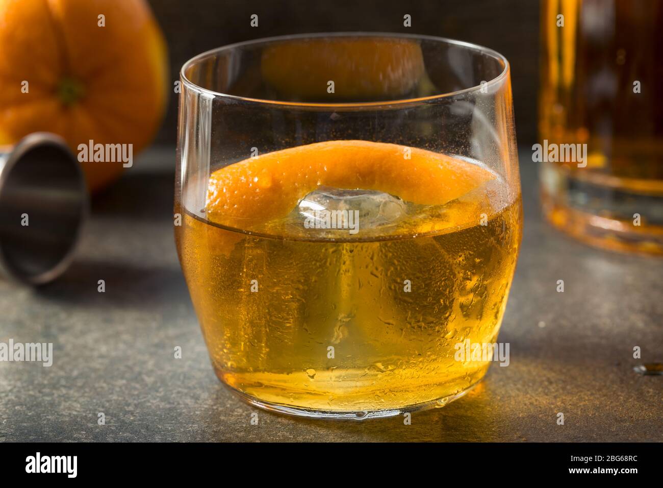 Boozy Japanese Whiskey Old Fashioned with an Orange Peel Stock Photo