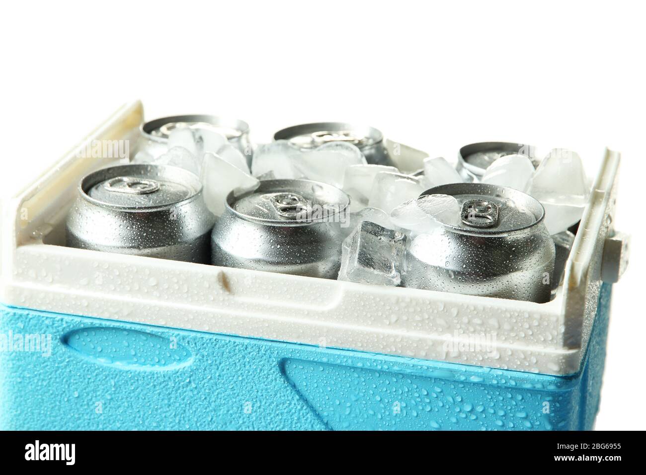Metal cans of beer with ice cubes in mini refrigerator, isolated on