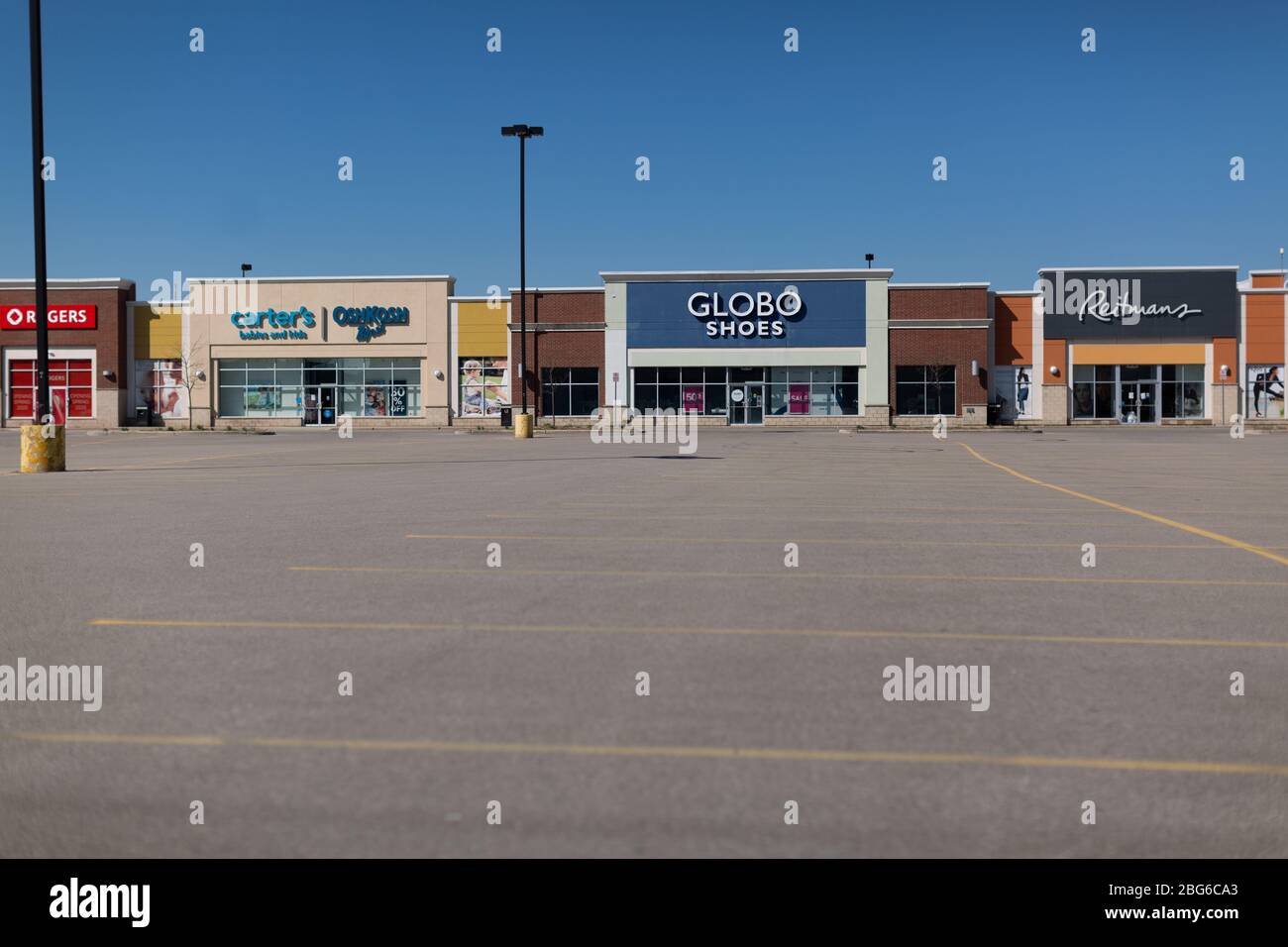 Closed and boarded up shops stores and restaurants in London, Ontario