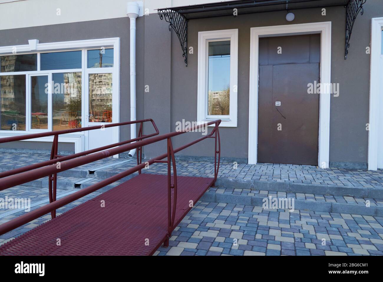 Wheelchair access ramp for entrance of residential multistory building ...