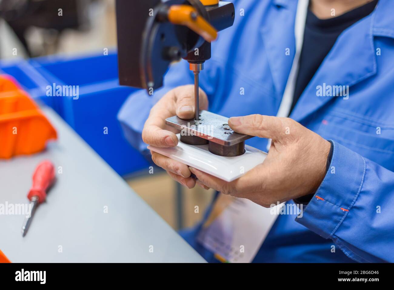 Electric socket handmade manufacturing process Stock Photo Alamy