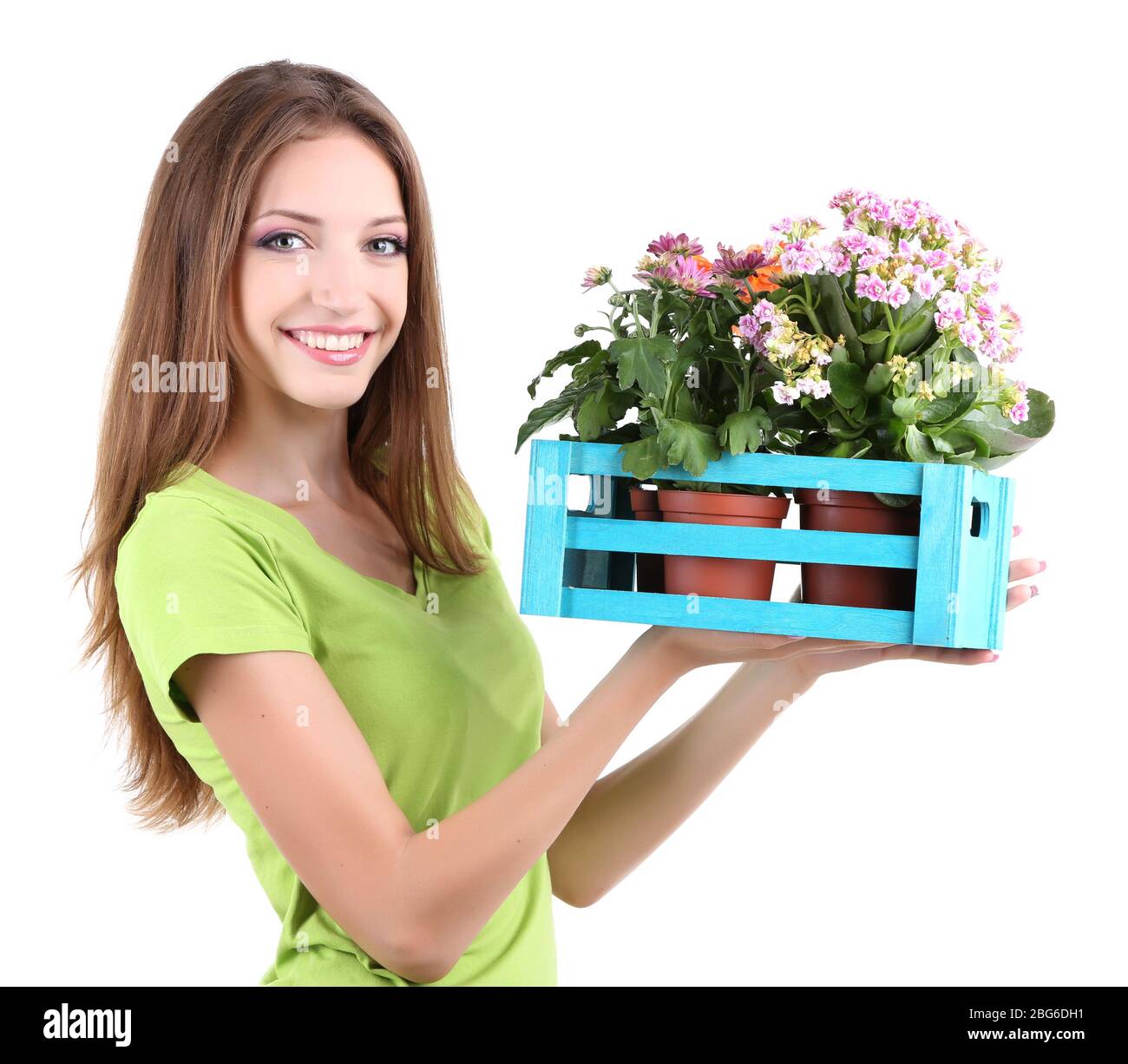 Beautiful girl with flower in pot isolated on white Stock Photo - Alamy