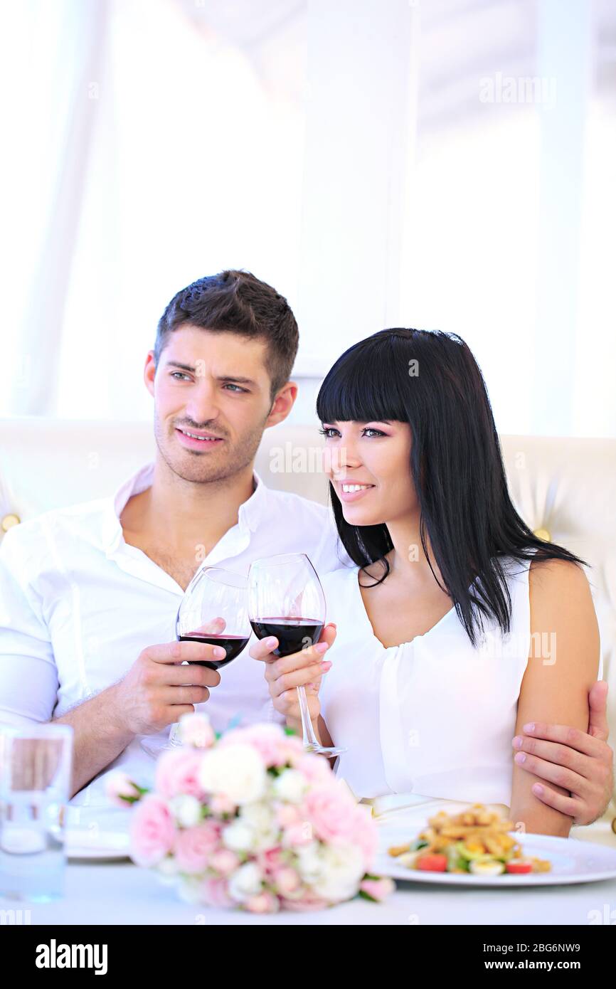 beautiful-couple-having-romantic-dinner-at-restaurant-stock-photo-alamy