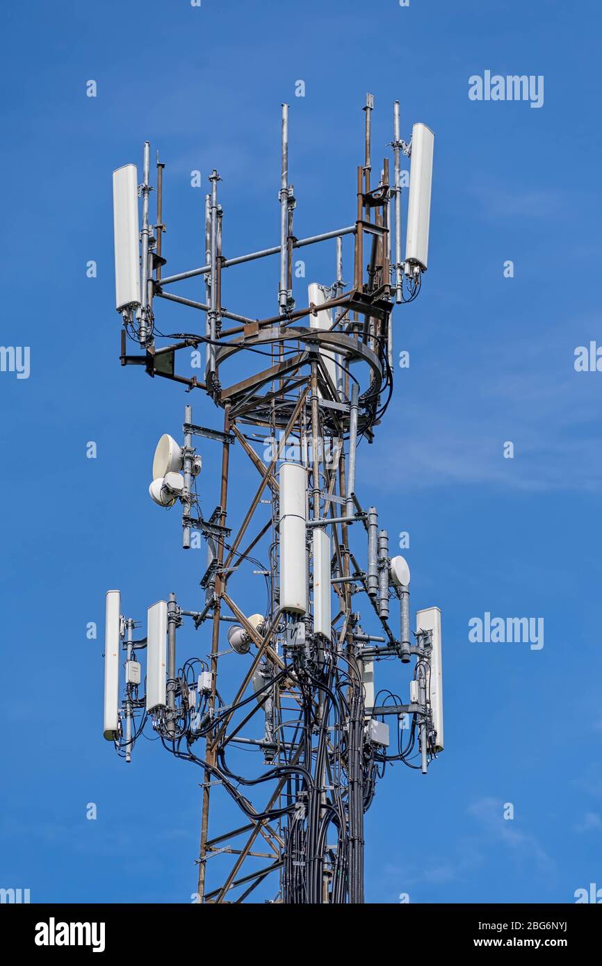 Directional mobile phone antenna aerials at the top of a mast Stock