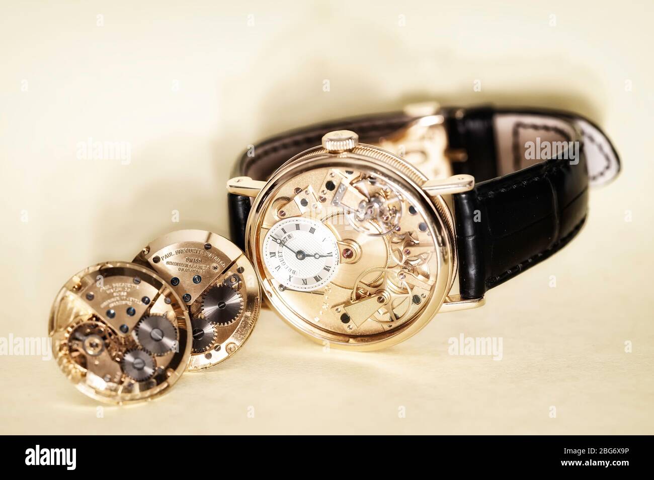 een beetje ik ben ziek Verbinding Mechanics of time: closeup of a Breguet watch showing internal mechanism  and parts and cufflinks made of Paul Breguette watch mechanisms, color  Stock Photo - Alamy