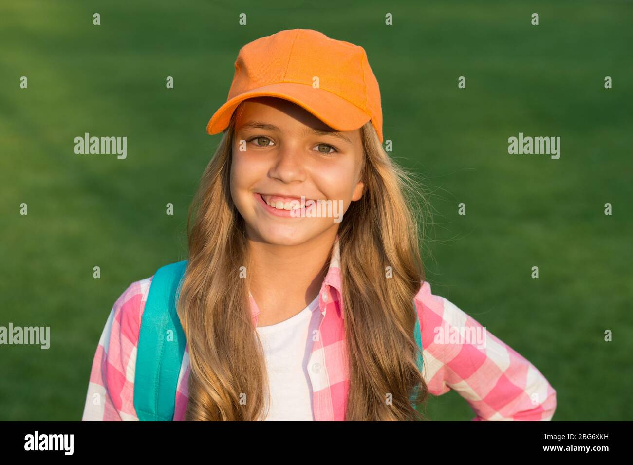Her Style is a Lot More Casual. Happy Child in Casual Style Natural  Outdoors. Little Girl Wear Baseball Cap Stock Photo - Image of girl,  comfort: 191947756