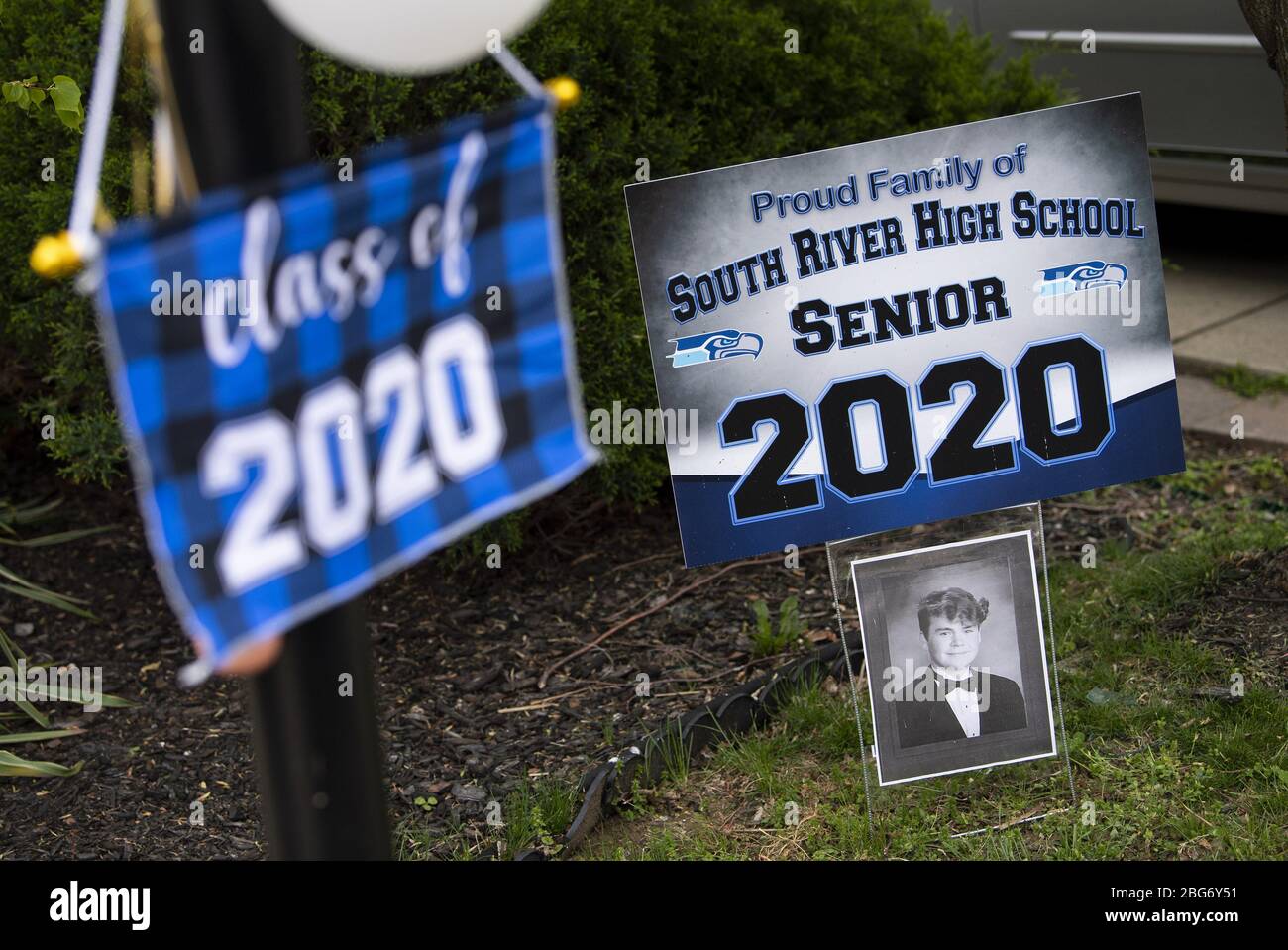 Edgewater, United States. 20th Apr, 2020. Class of 2020 decorations adorn the front yard of a house in Edgewater, Maryland on Monday, April 20, 2020. Most high school in the region have cancelled graduations and other end of the year events due to the Coronavirus COVID-19 pandemic. Photo by Kevin Dietsch/UPI Credit: UPI/Alamy Live News Stock Photo