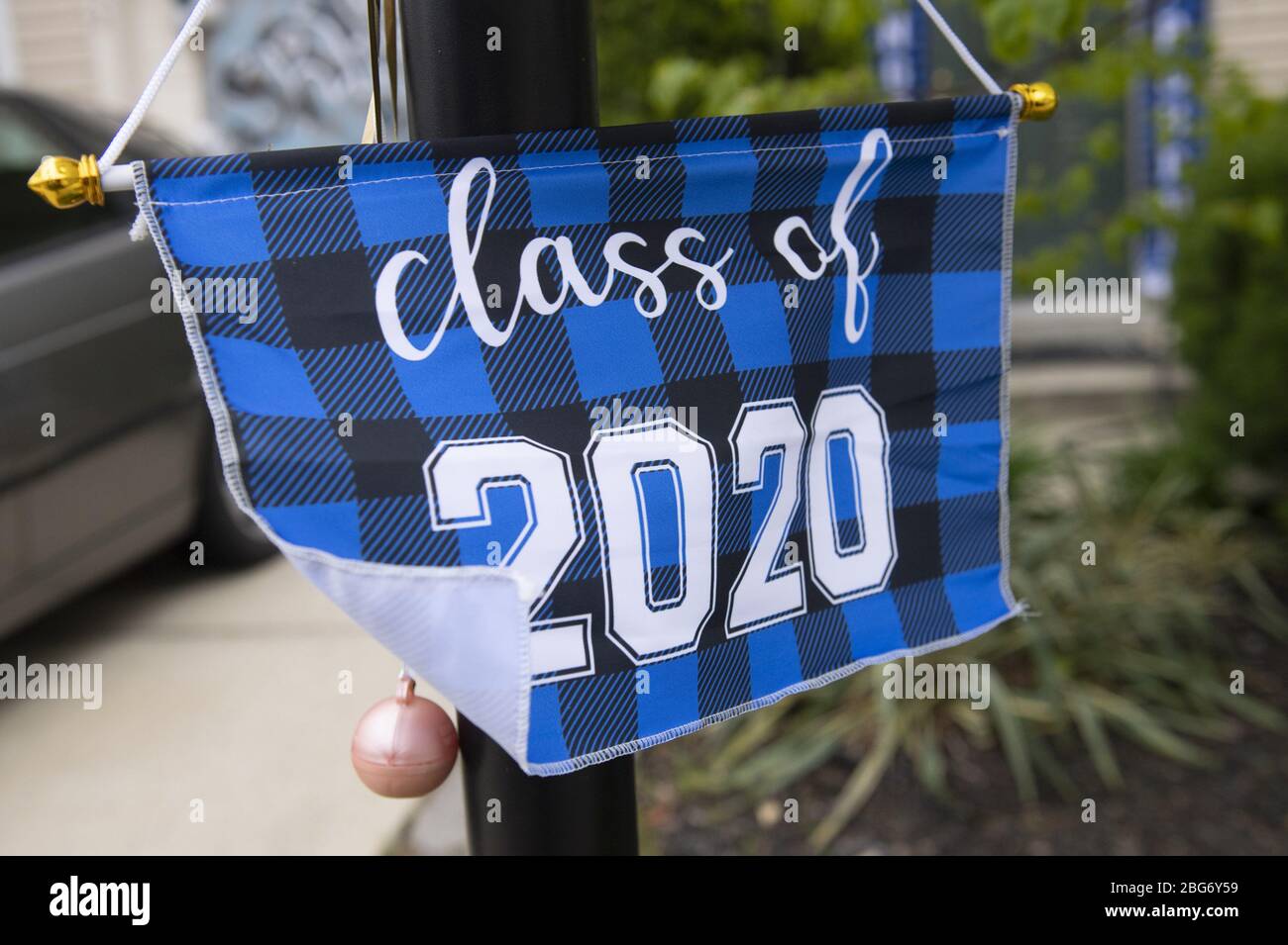 Edgewater, United States. 20th Apr, 2020. Class of 2020 decorations adorn the frontyard of a house in Edgewater, Maryland on Monday, April 20, 2020. Most high school in the region have cancelled graduations and other end of the year events due to the Coronavirus COVID-19 pandemic. Photo by Kevin Dietsch/UPI Credit: UPI/Alamy Live News Stock Photo